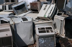 old-air-conditioners-in-a-pile