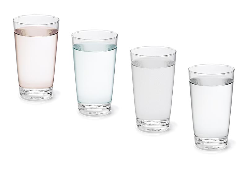 Single glass with clean drinking water isolated on white background close up